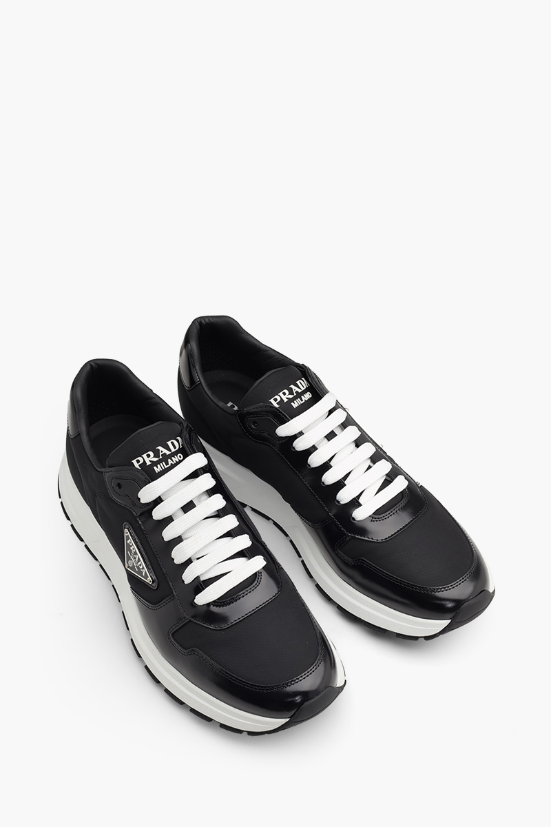 PRADA Men Triangle Logo Sneakers in Black/White Re-Nylon and Brushed Leather 1