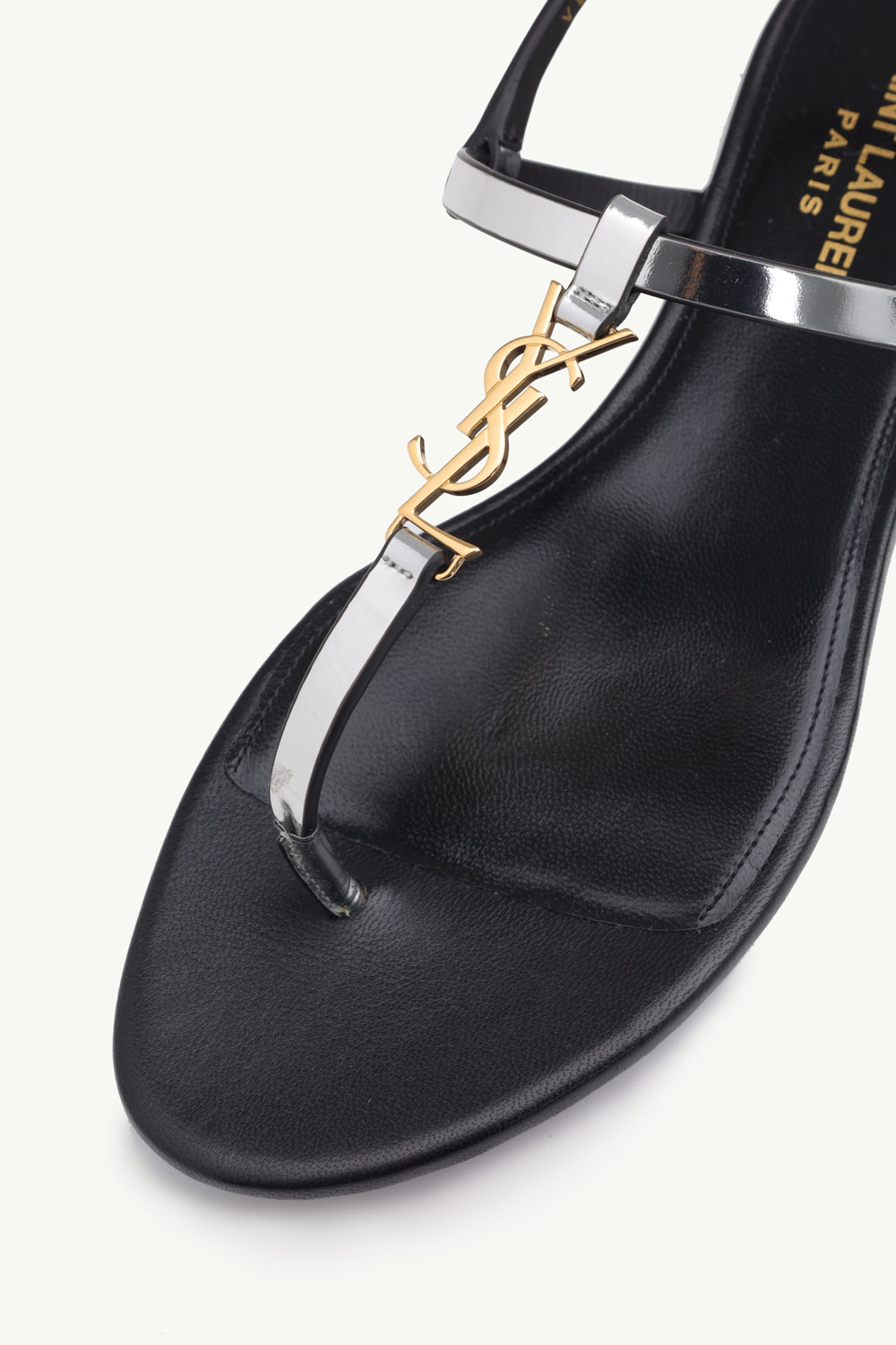 SAINT LAURENT Women Cassandra Flat Ankle Strap Sandals in Argent Reflective Leather with Gold-Tone Monogram 4