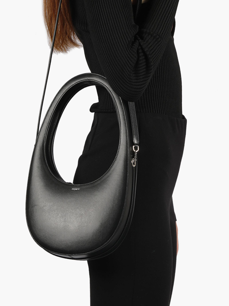 COPERNI Swipe Oval-Shaped Crossbody Bag in Black Calf 4