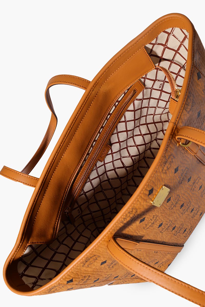MCM Medium Toni Top-Zip Shopper Bag in Cognac Visetos Leather 3